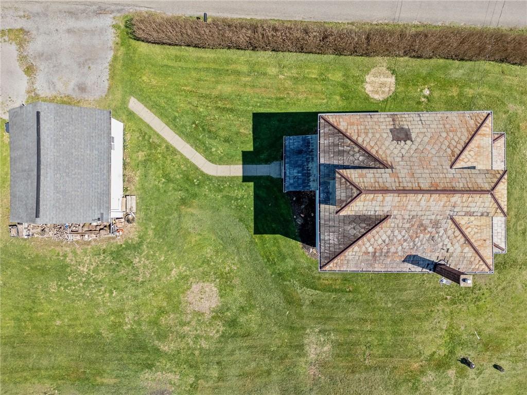 685 Herman Road Butler, PA 16002 - Photo 43 of 43 an aerial view of a house with a garden and a yard
