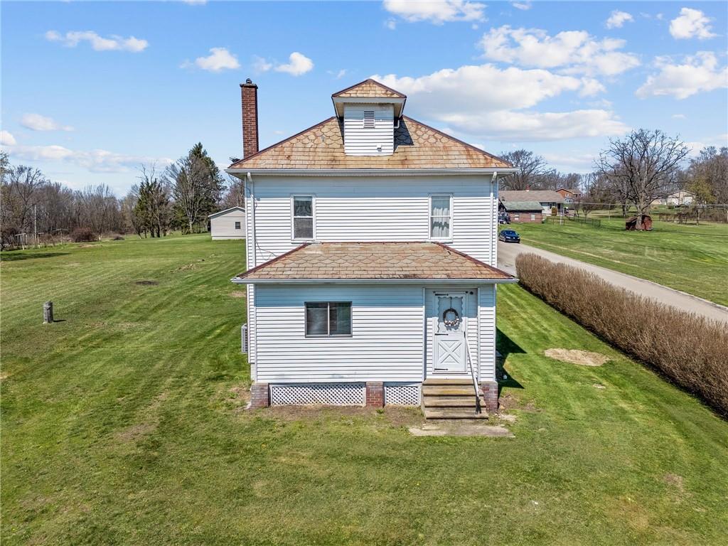 685 Herman Road Butler, PA 16002 - Photo 5 of 43 a front view of a house with a yard