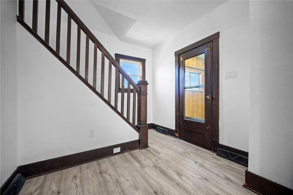 685 Herman Road Butler, PA 16002 - Photo 6 of 43 a view of an entryway with wooden floor
