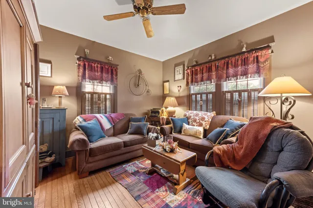 a view of a balcony with wooden floor