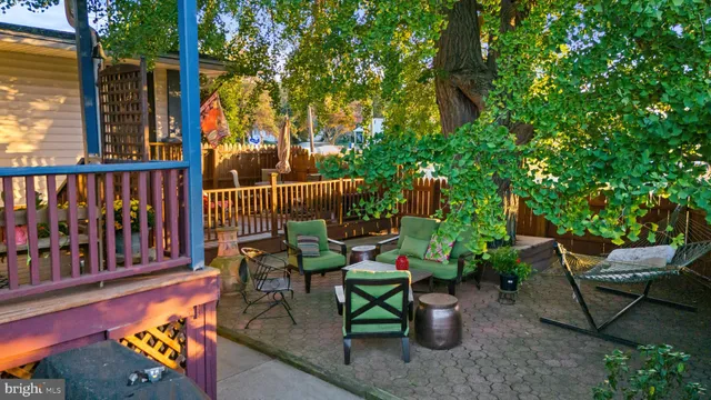 a view of a bench in a backyard
