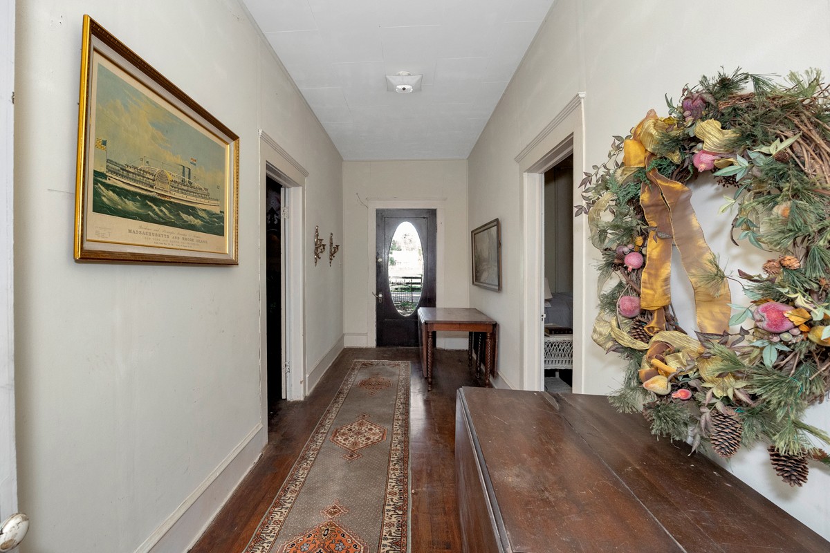 395 Case Road Prospect, TN 38477 - Photo 12 of 48 a view of a hallway with wooden floor and a potted plant
