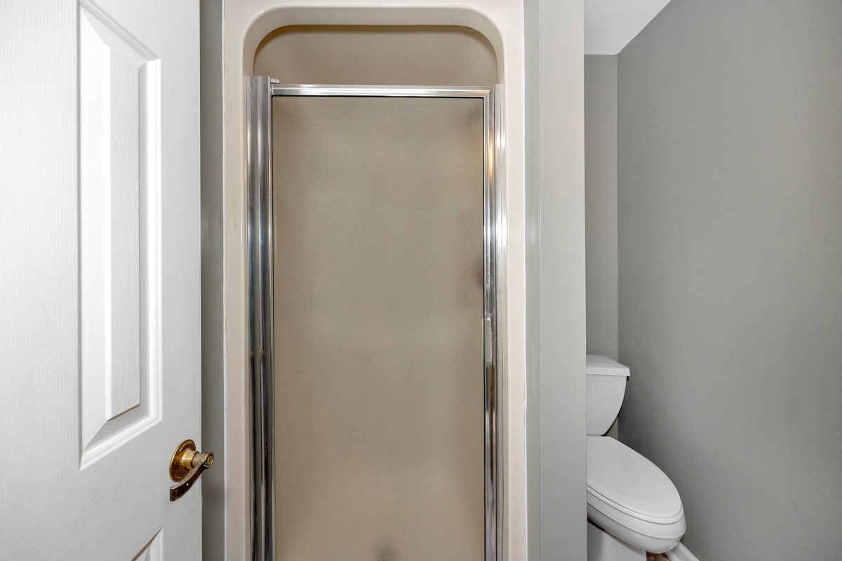 395 Case Road Prospect, TN 38477 - Photo 29 of 48 a white toilet sitting next to a bathroom sink