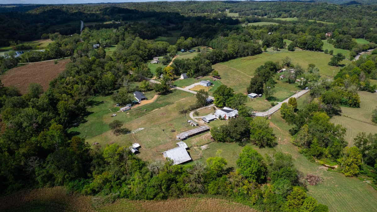 395 Case Road Prospect, TN 38477 - Photo 48 of 48 an aerial view of residential house with outdoor space and trees all around