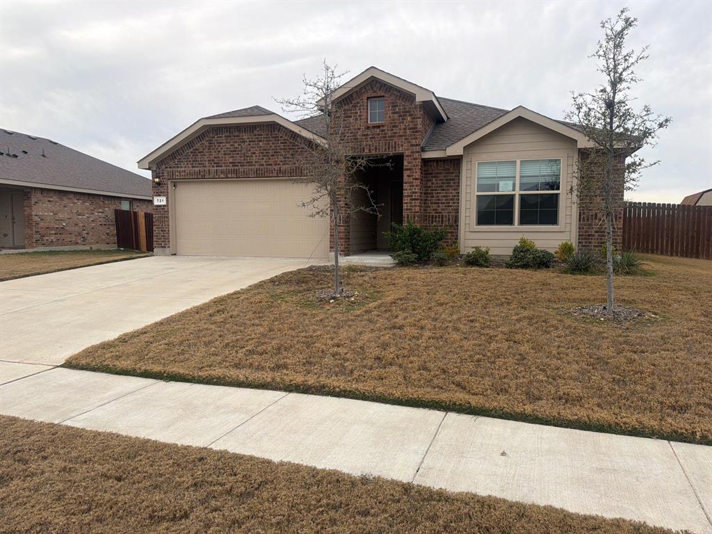 721 Durango Lane Cleburne, TX 76033 - Photo 1 of 25 a front view of a house with a yard