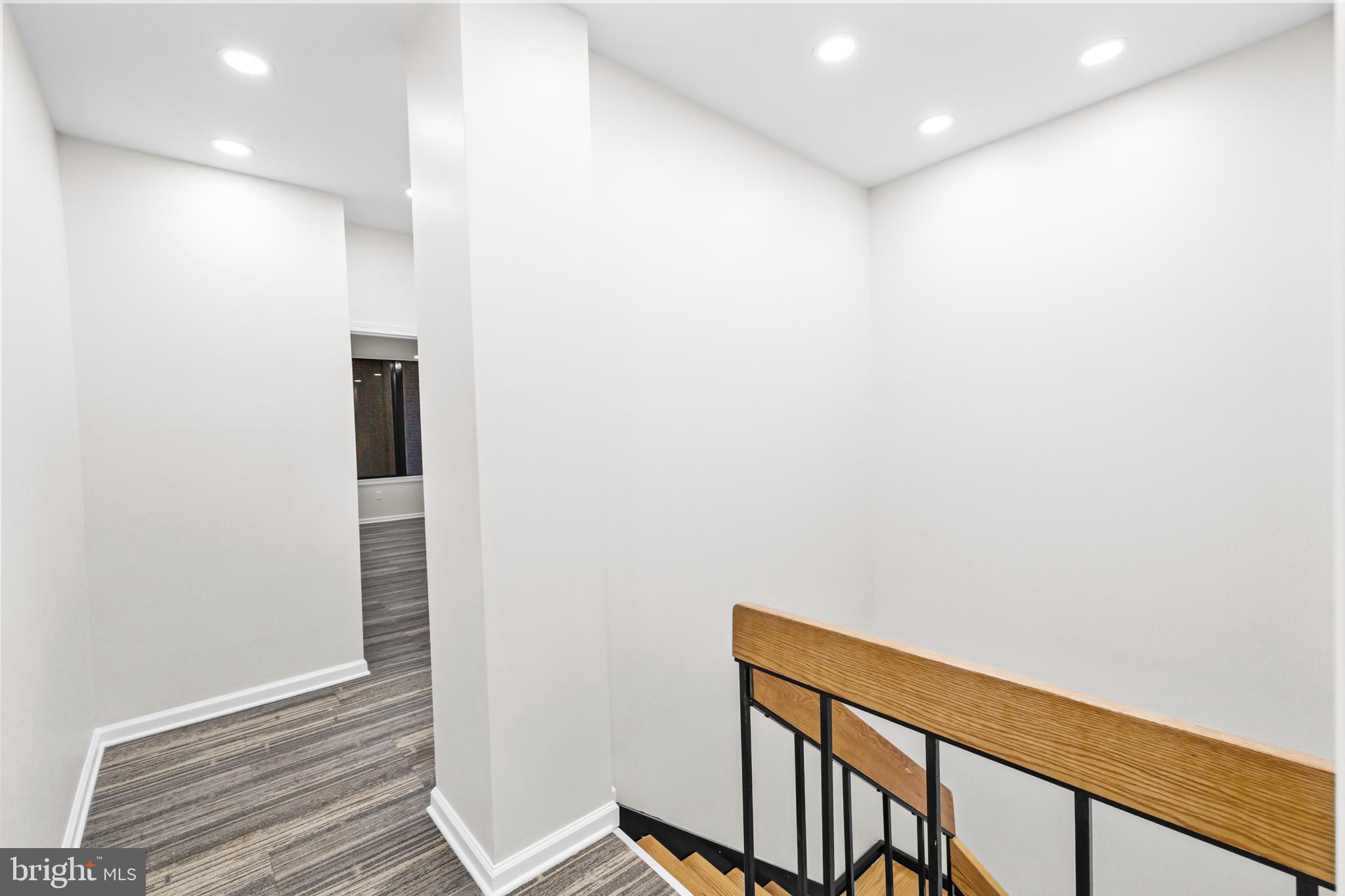 1615 Q Street Northwest, Unit T1 Washington, DC 20009 - Photo 16 of 42 a view of hallway with wooden floor