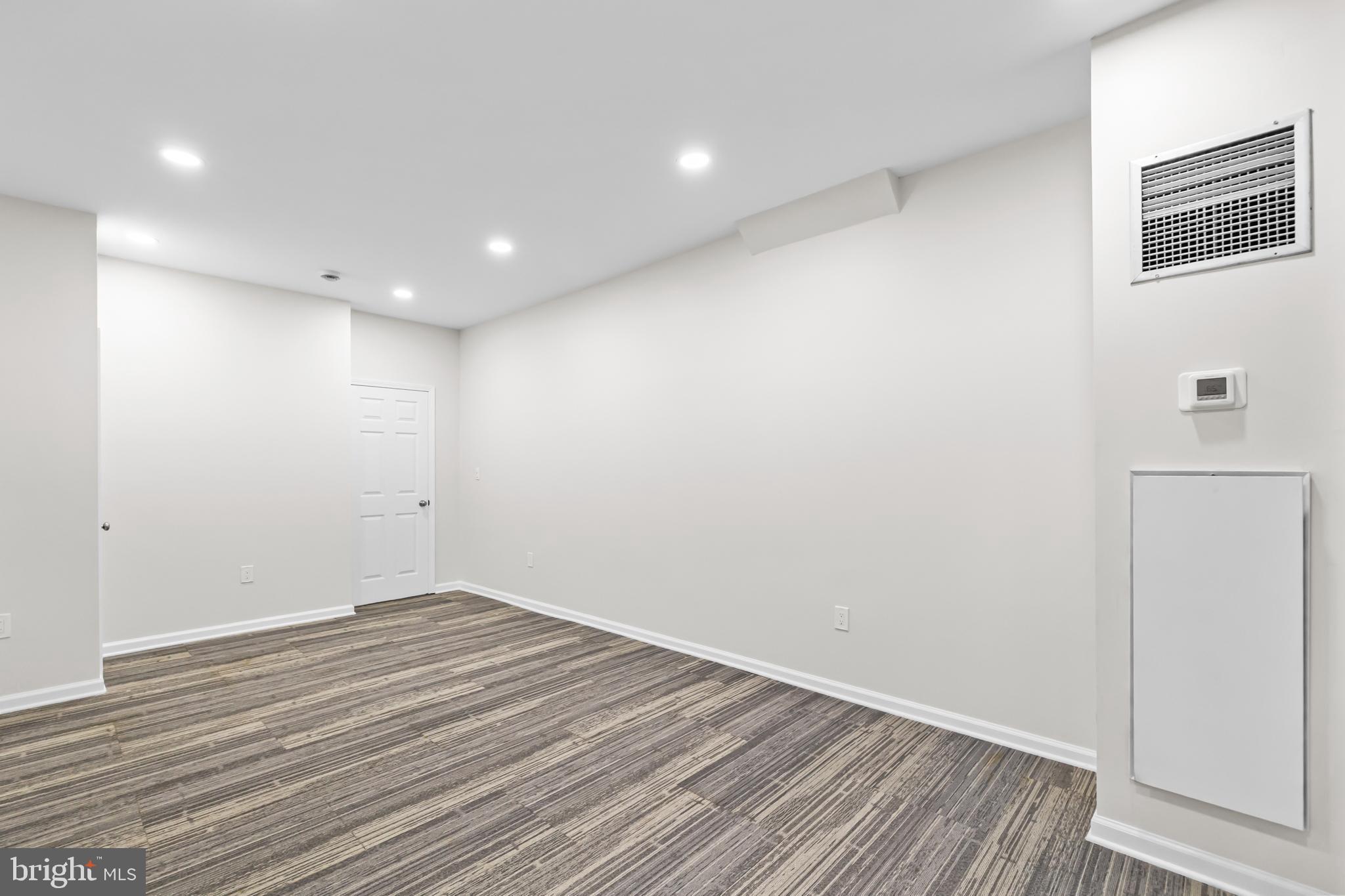 1615 Q Street Northwest, Unit T1 Washington, DC 20009 - Photo 19 of 42 a view of room with wooden floor