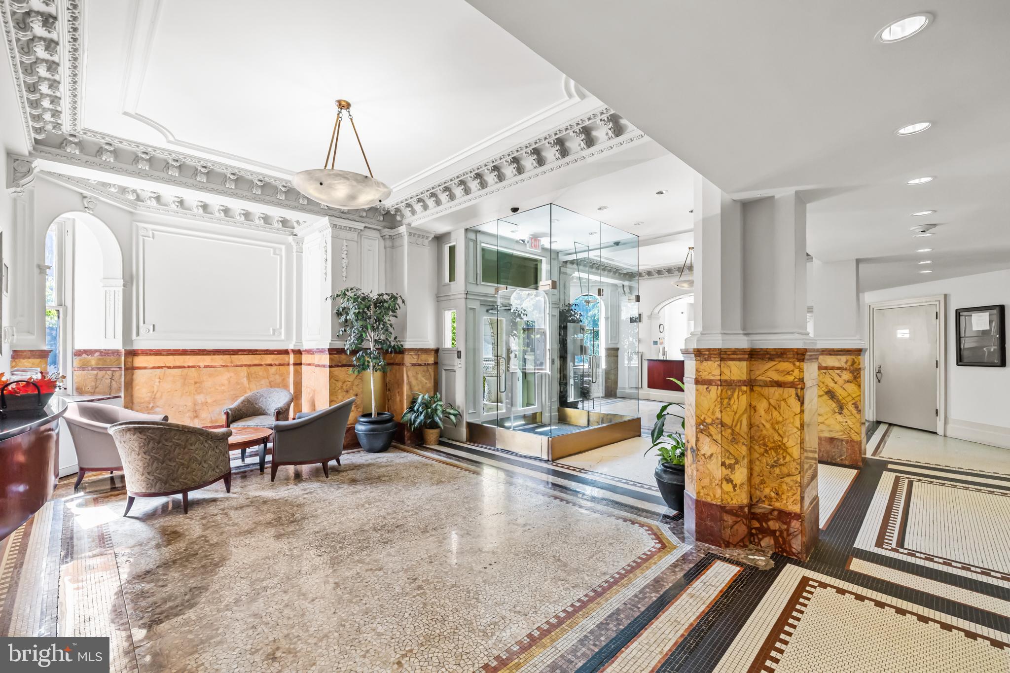 1615 Q Street Northwest, Unit T1 Washington, DC 20009 - Photo 35 of 42 a view of a living room and chandelier