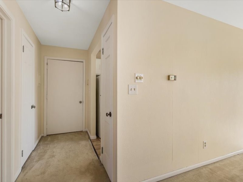 706 Kiwanis Drive, Unit 4 Freeport, IL 61032 - Photo 6 of 23 a view of a hallway with wooden floor