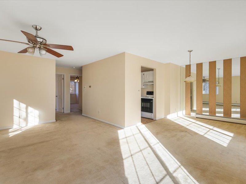 706 Kiwanis Drive, Unit 4 Freeport, IL 61032 - Photo 9 of 23 a view of a livingroom with a staircase