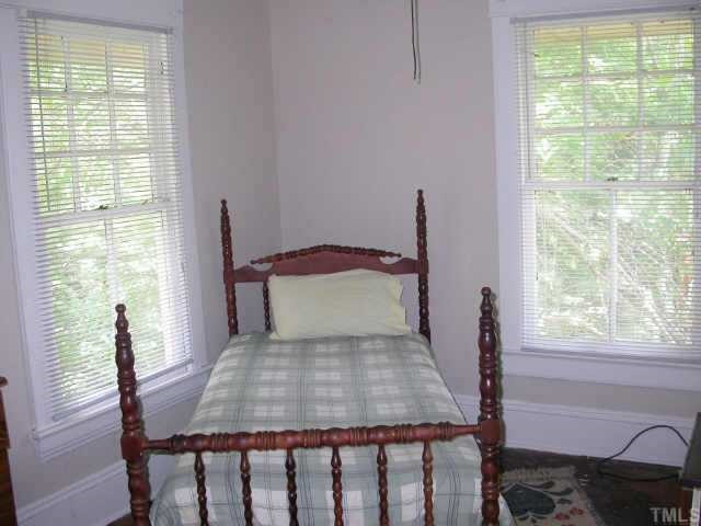 509 East Franklin Street Raleigh, NC 27604 - Photo 7 of 10 Another Bedroom that has tremendous flexibility and could be used as a nursery, home office, craft or hobby room. it has 2 windows, closet, ceiling fan/light and hardwood floors. Other