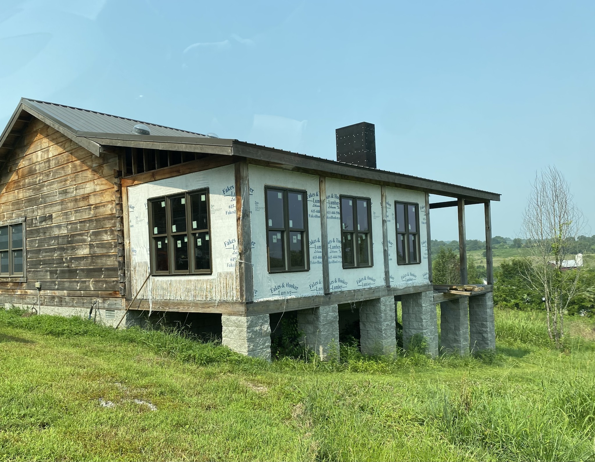 766 Neal Road Watertown, TN 37184 - Photo 1 of 25 a front view of a house with a yard