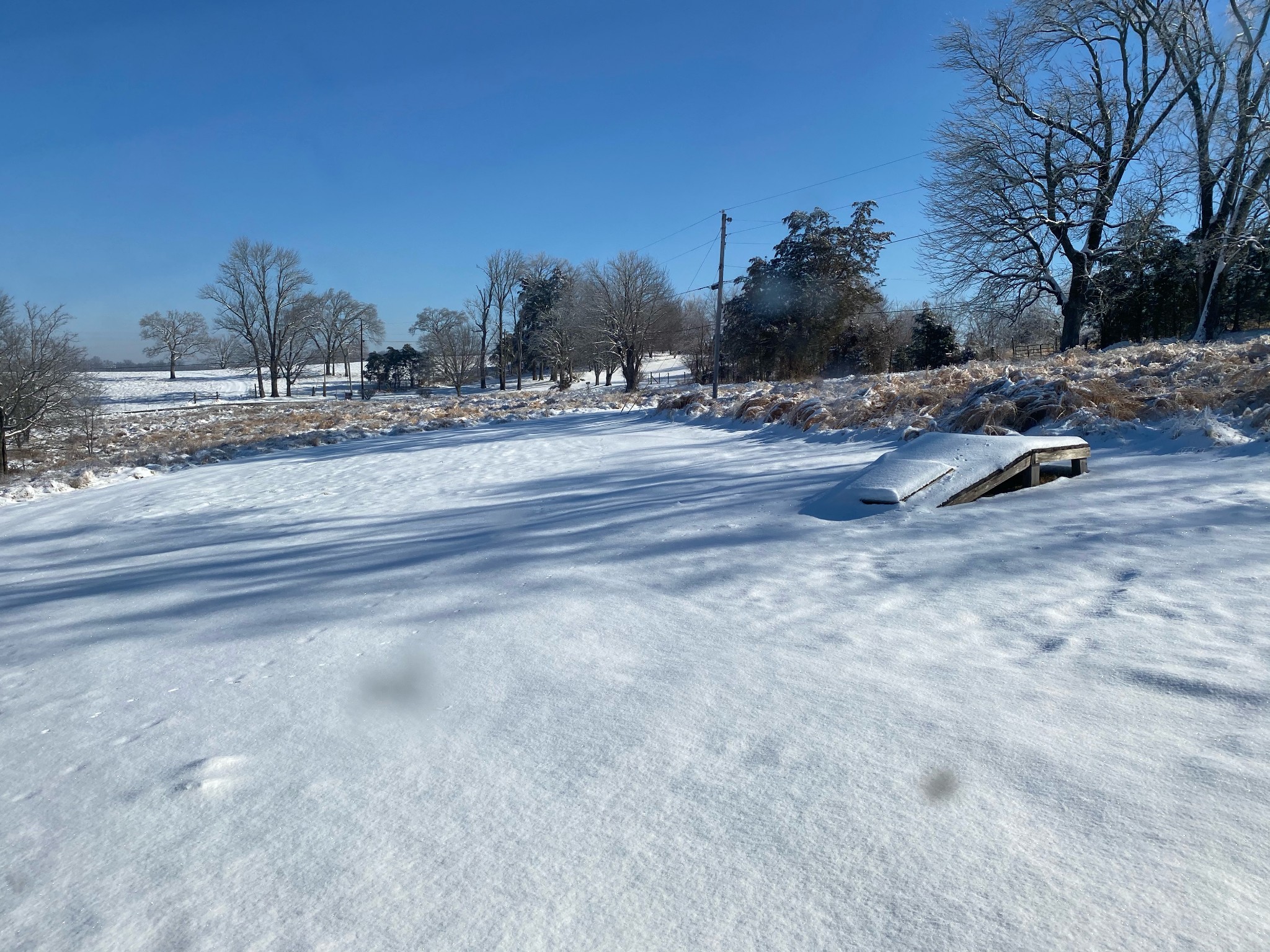 766 Neal Road Watertown, TN 37184 - Photo 11 of 25 a view of road with a building in the background