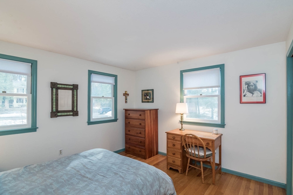 171 Aubinwood Road Amherst, MA 01002 - Photo 23 of 42 a bedroom with furniture and a window