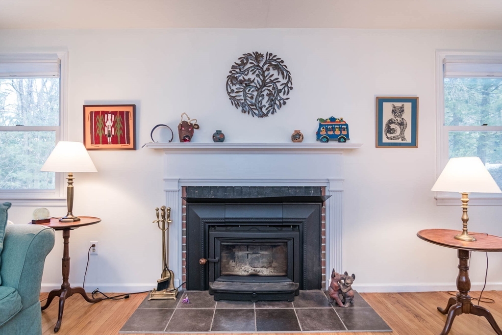 171 Aubinwood Road Amherst, MA 01002 - Photo 9 of 42 a living room with furniture and a fireplace