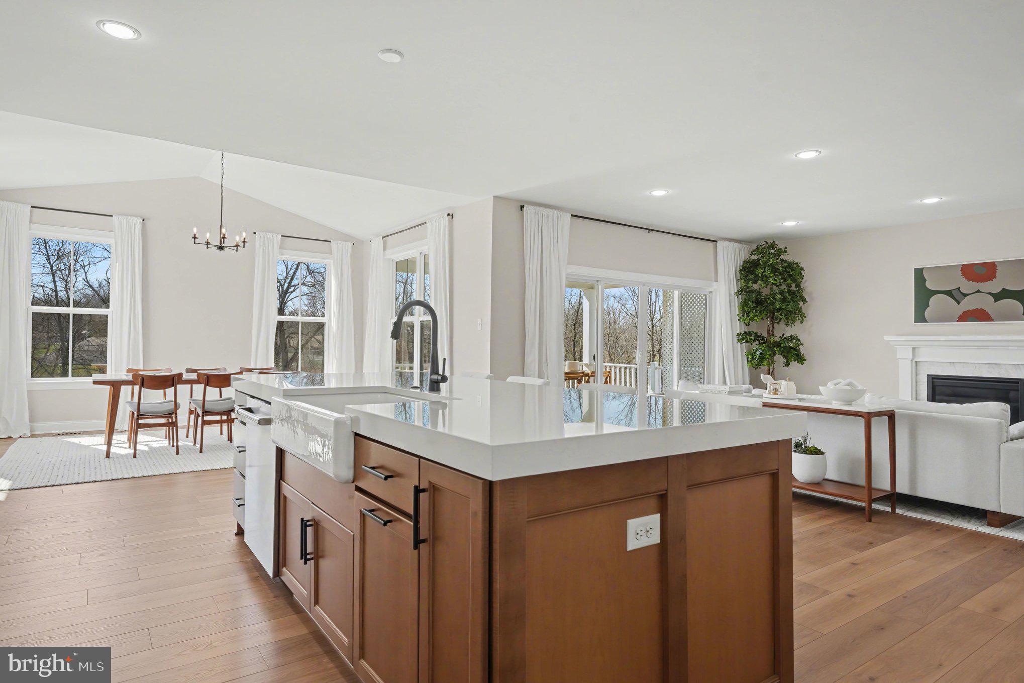 236 Indian Creek Road Telford, PA 18969 - Photo 12 of 51 a dining hall with stainless steel appliances granite countertop a sink stove and wooden floor