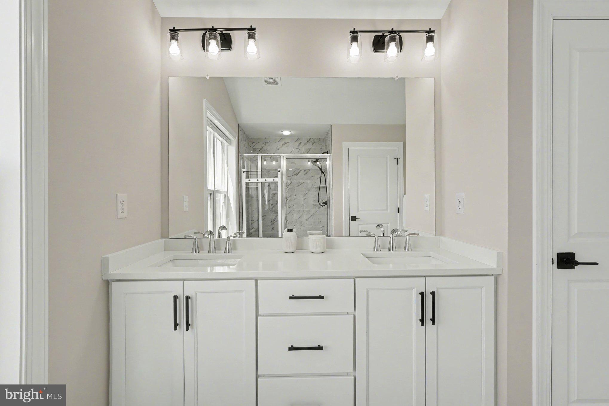 236 Indian Creek Road Telford, PA 18969 - Photo 33 of 51 a bathroom with a sink and a mirror