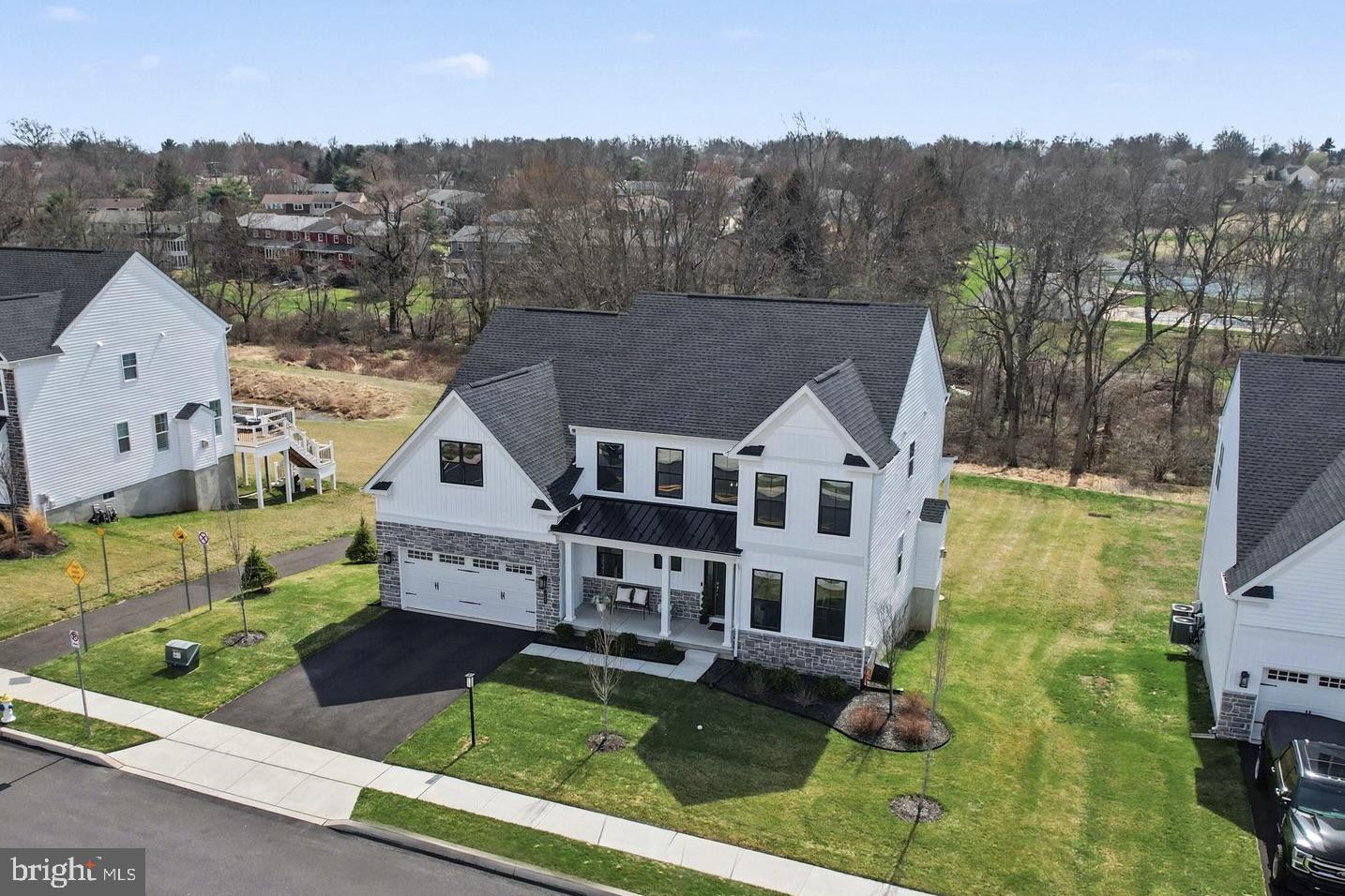 236 Indian Creek Road Telford, PA 18969 - Photo 49 of 51 an aerial view of a house with a big yard and large trees