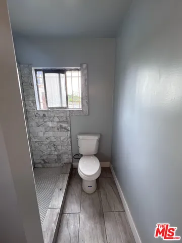 a bathroom with a toilet