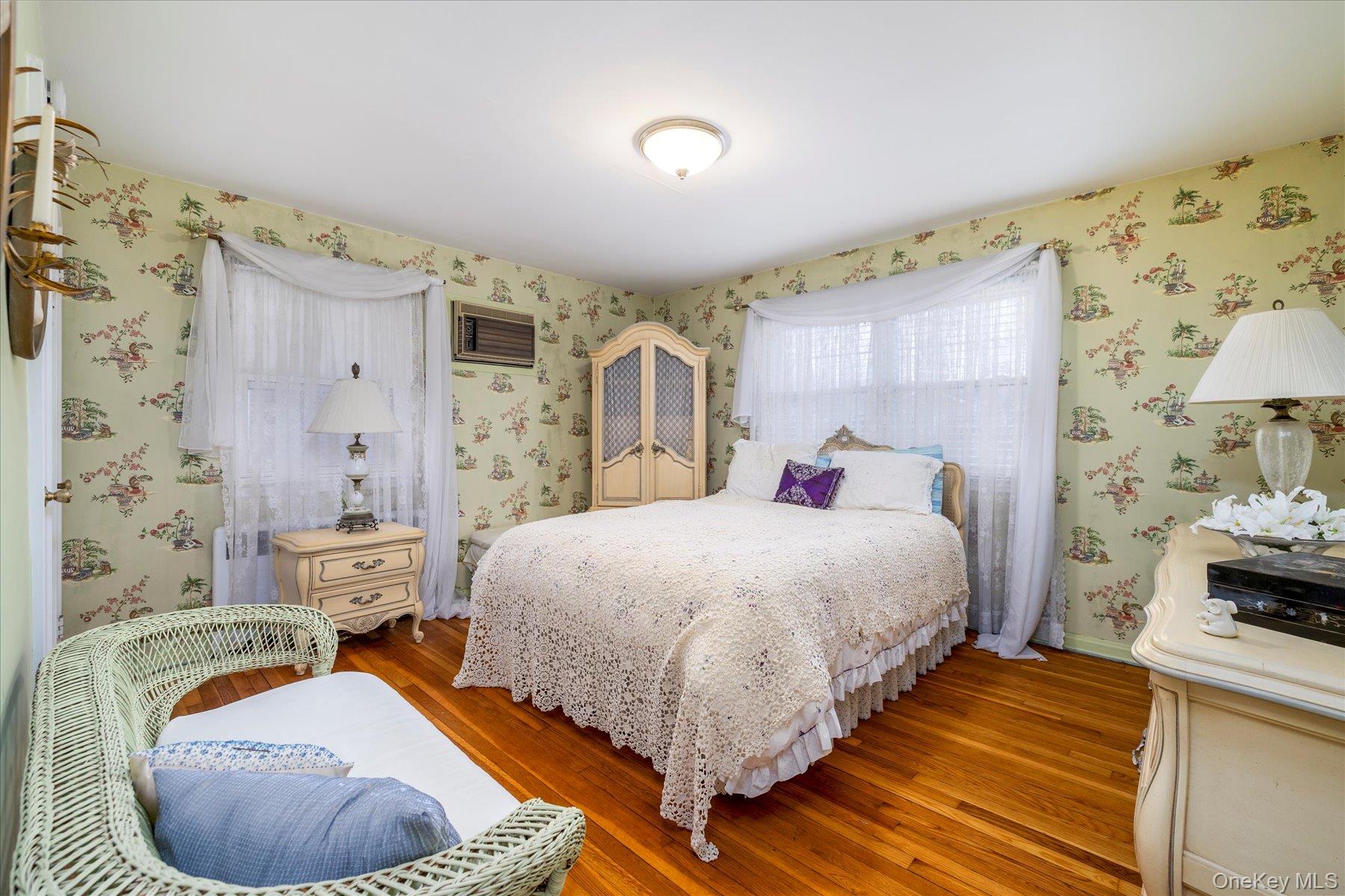 36 Wellsboro Road Valley Stream, NY 11580 - Photo 11 of 15 a bed room with a bed and a chair