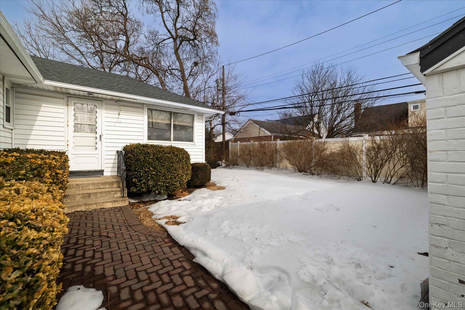 36 Wellsboro Road Valley Stream, NY 11580 - Photo 14 of 15 a view of a house with a yard