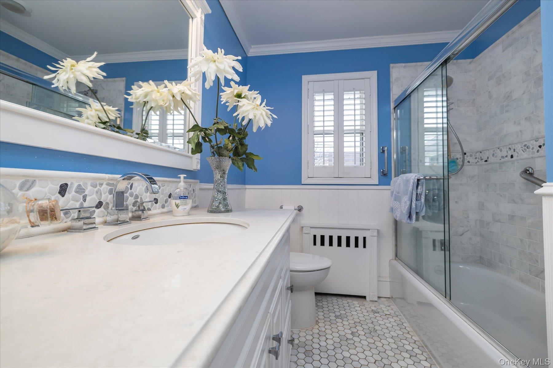 36 Wellsboro Road Valley Stream, NY 11580 - Photo 10 of 15 a spacious bathroom with a tub sink and a mirror