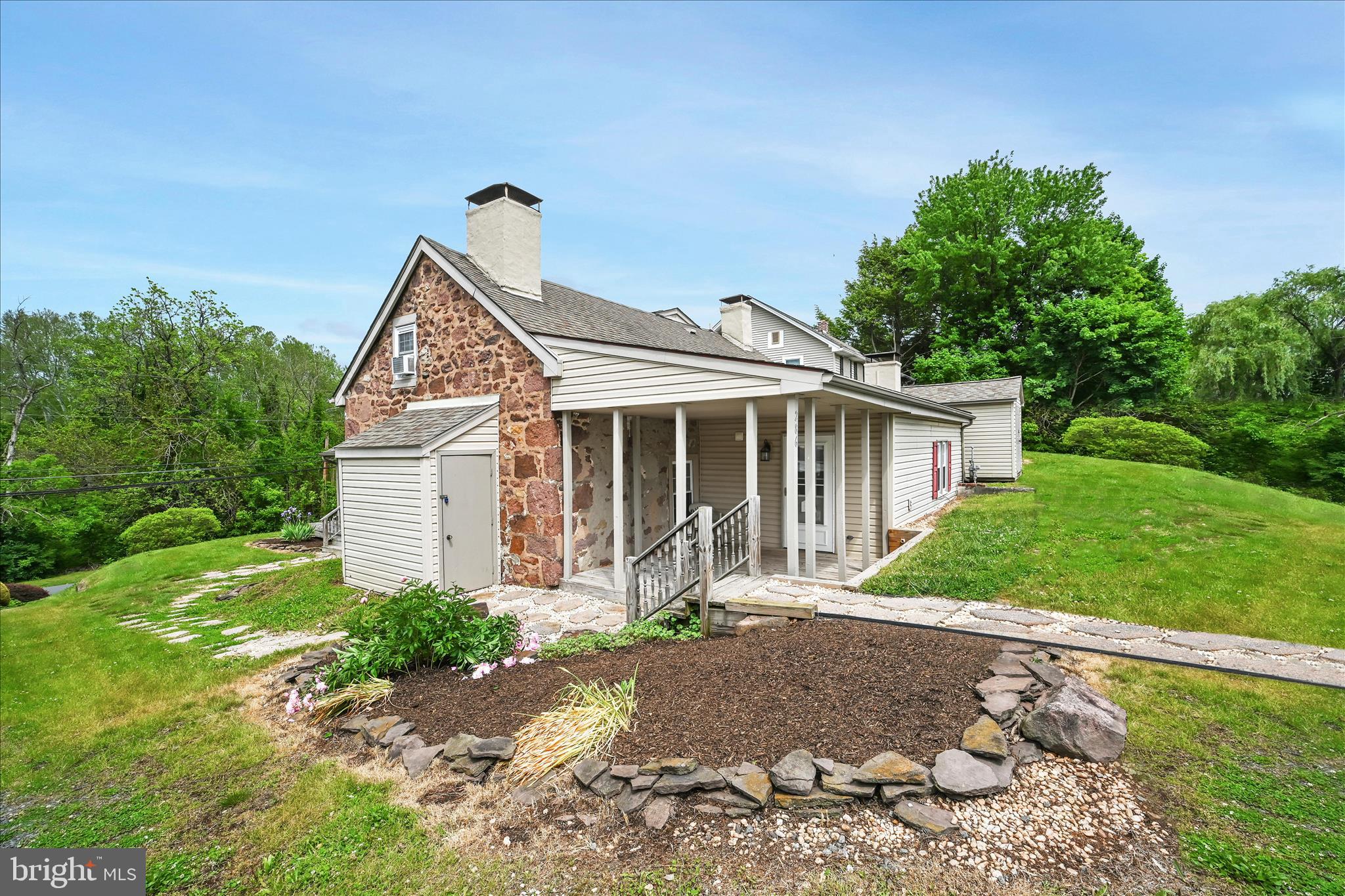 286 Schuylkill Road Birdsboro, PA 19508 - Photo 3 of 39 a front view of a house with garden