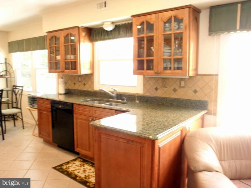 8782 Oxwell Lane Laurel, MD 20708 - Photo 8 of 29 Kitchen w/ Lots of Sunlight