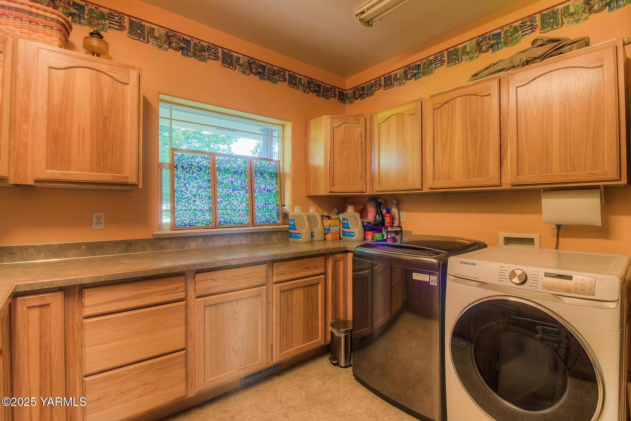 11901 Zier Road Yakima, WA 98908 - Photo 20 of 46 a kitchen with sink cabinets and window