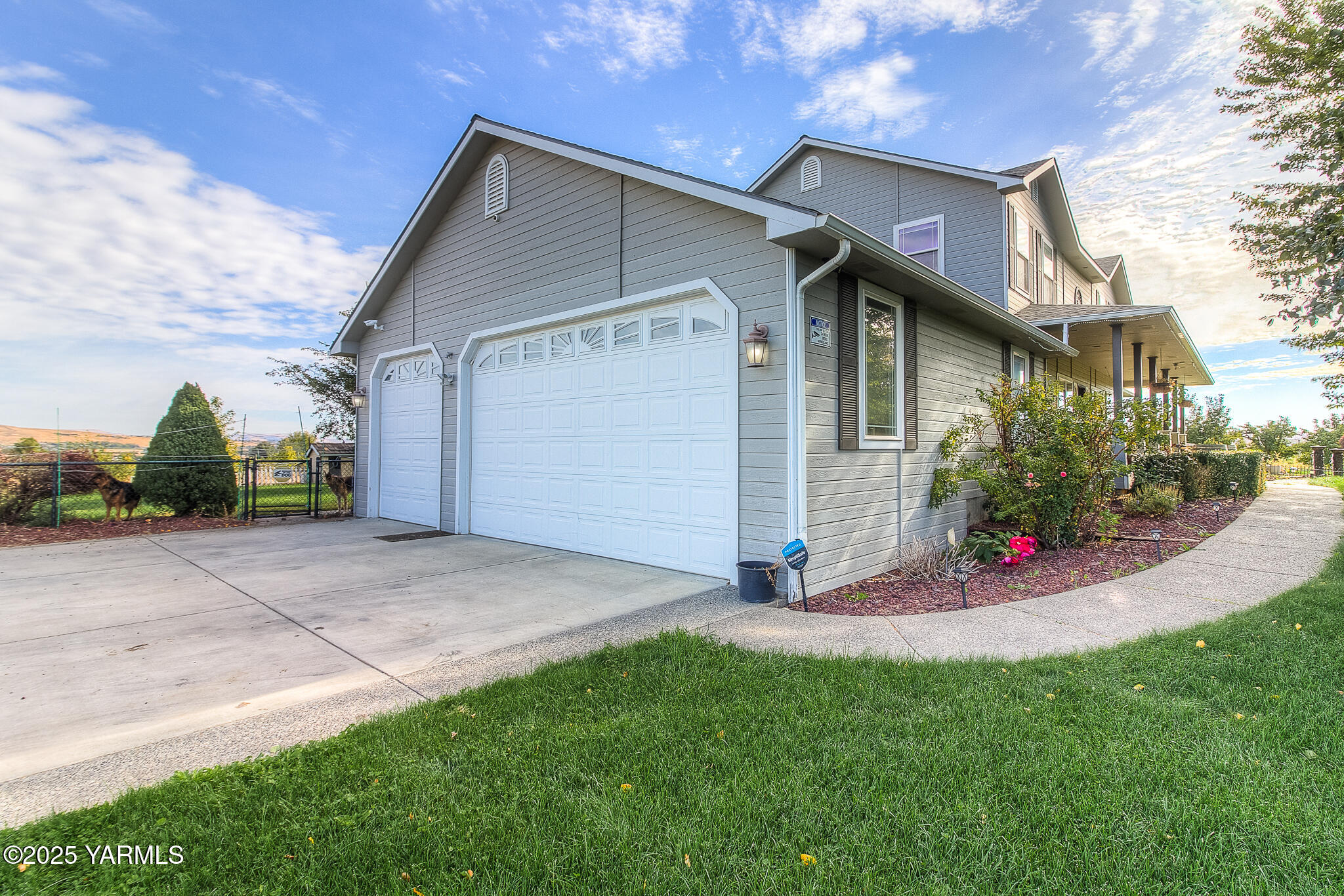 11901 Zier Road Yakima, WA 98908 - Photo 32 of 46 a view of a house with a yard