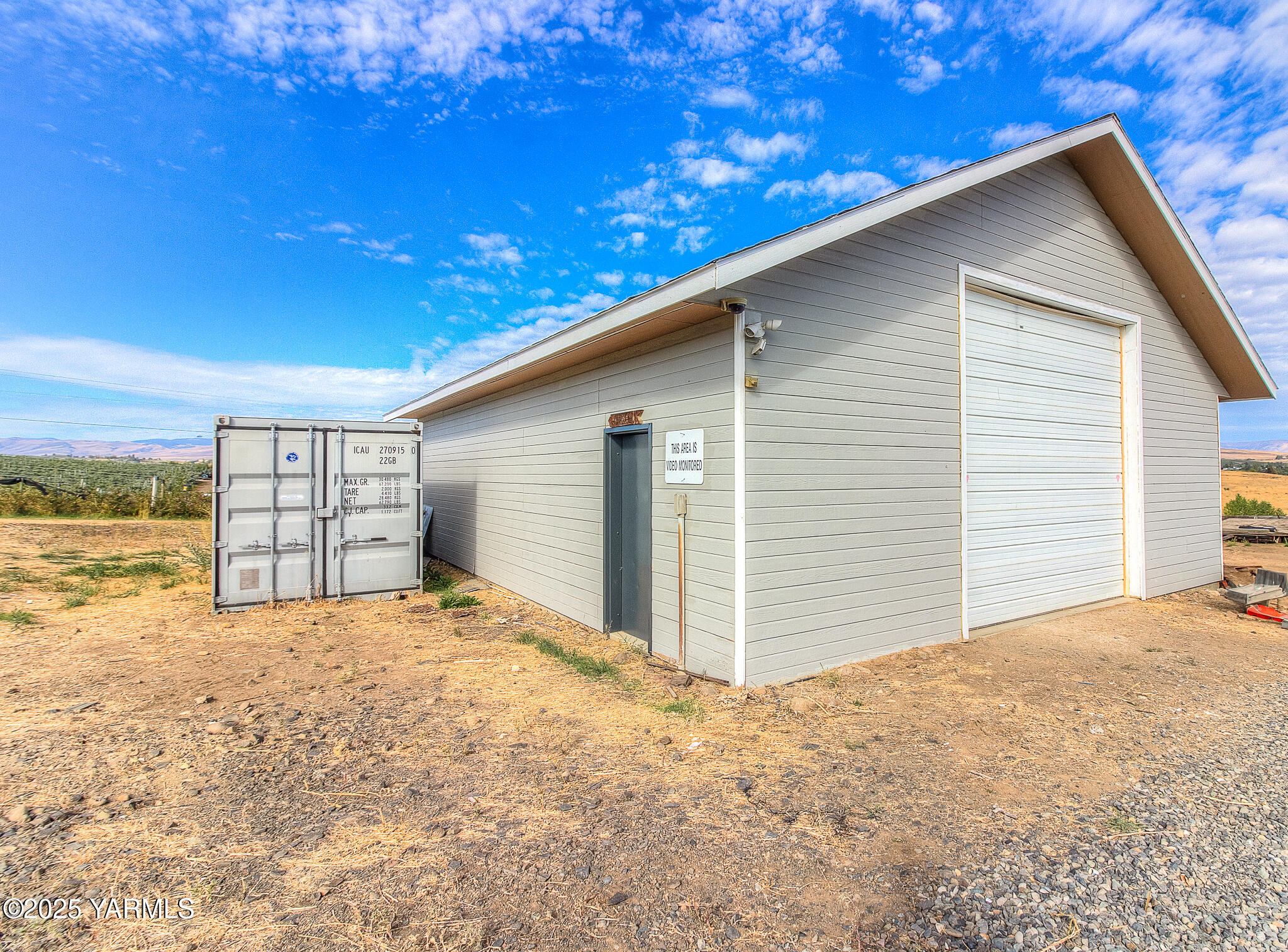 11901 Zier Road Yakima, WA 98908 - Photo 35 of 46 a view of yellow house with a outdoor space