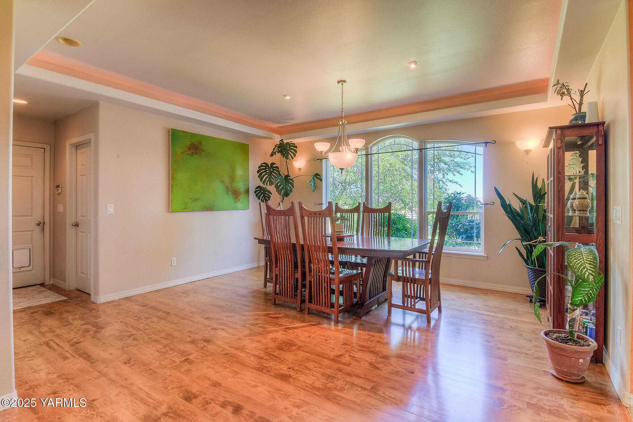 11901 Zier Road Yakima, WA 98908 - Photo 8 of 46 a dining room with furniture window and wooden floor