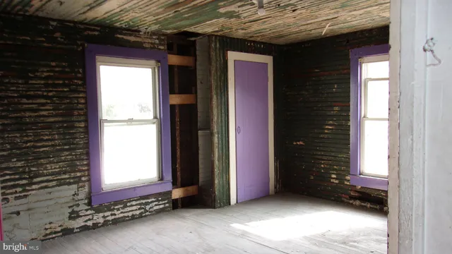 a view of an empty room and window