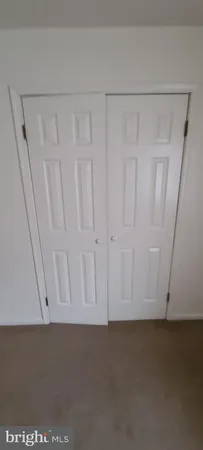 a bathroom with a toilet and a sink