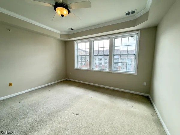 a bathroom with a shower sink and mirror
