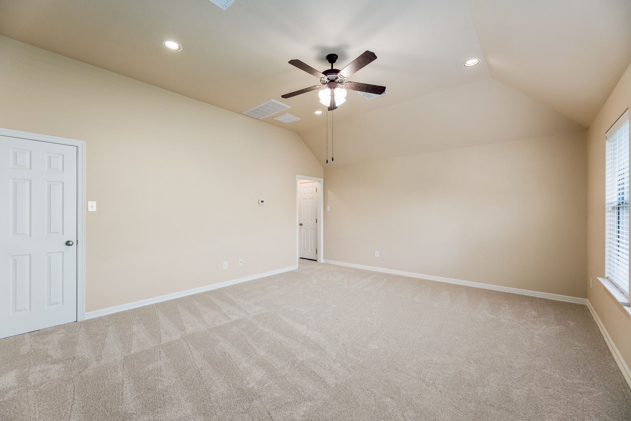 20804 Windmill Ridge Street Pflugerville, TX 78660 - Photo 31 of 40 The game room comes with closet storage and a full bath making it a great contender for a large 4th bedroom.