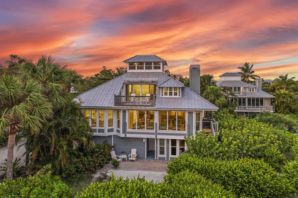 22 Seawatch Drive Boca Grande, FL 33921 - Photo 49 of 72 a front view of a house with a yard