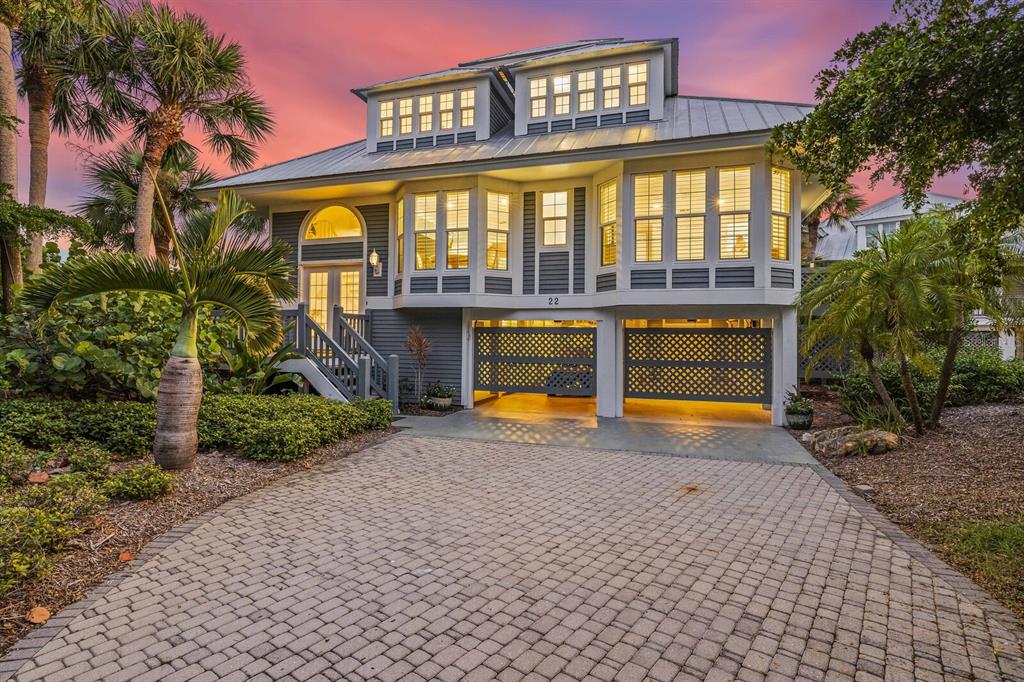 22 Seawatch Drive Boca Grande, FL 33921 - Photo 53 of 72 a view of a building with a swimming pool