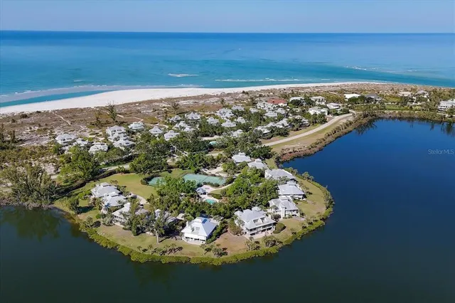 a view of lake and houses with outdoor space