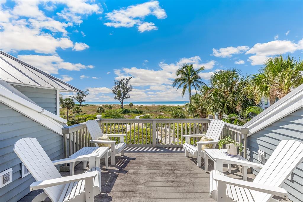 22 Seawatch Drive Boca Grande, FL 33921 - Photo 62 of 72 a view of a chairs and table in patio