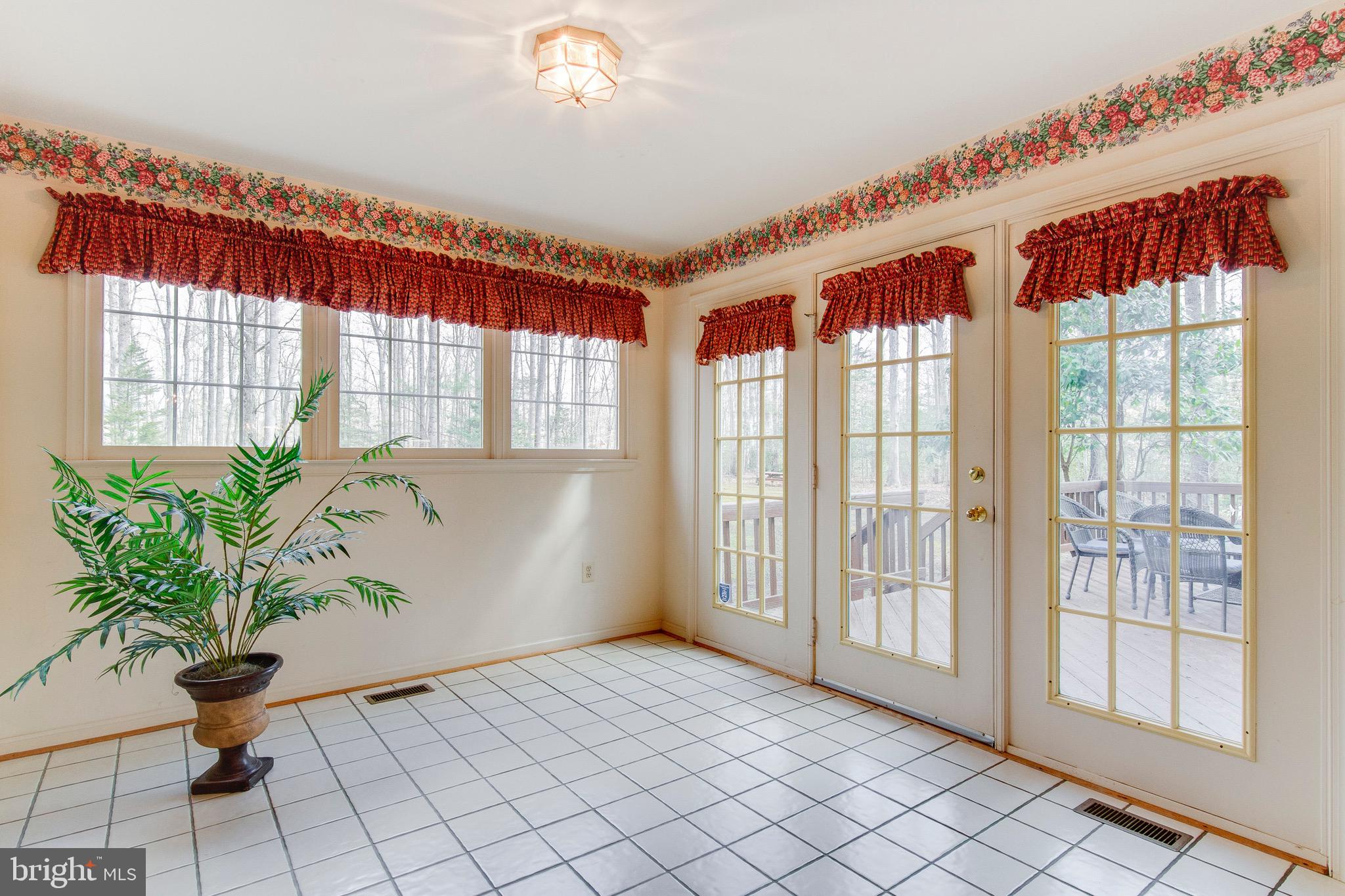 1 Winning Colors Road Stafford, VA 22556 - Photo 14 of 36 Beautiful doors from sunroom to deck