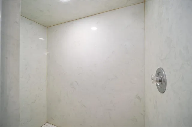 a bathroom with a shower curtain