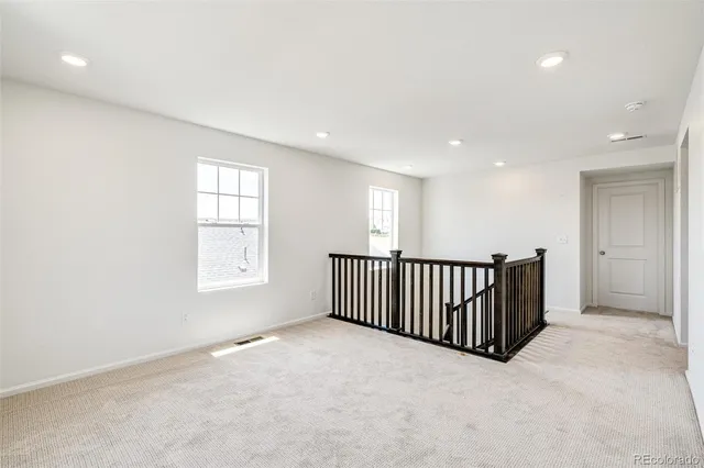 an empty room with a bathroom