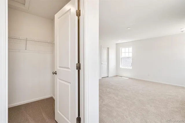 a bathroom with a double vanity sink and mirror