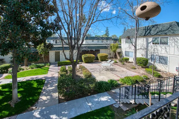 a view of yard with patio