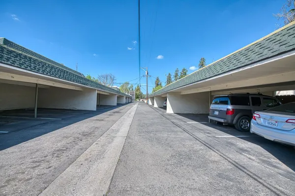 a view of a car in front of a house