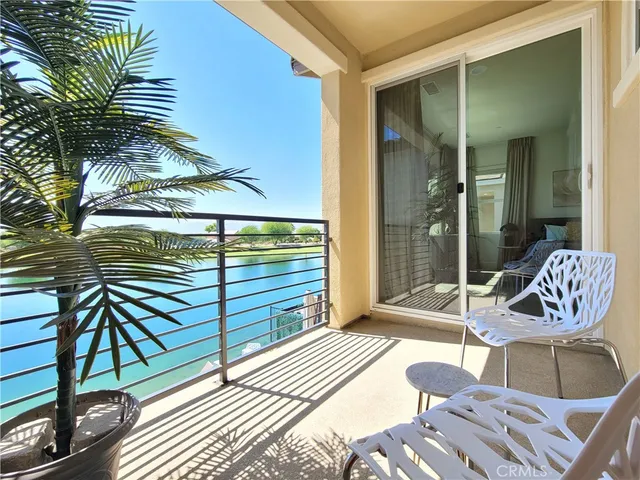 a spacious bathroom with a double vanity sink a mirror and a shower
