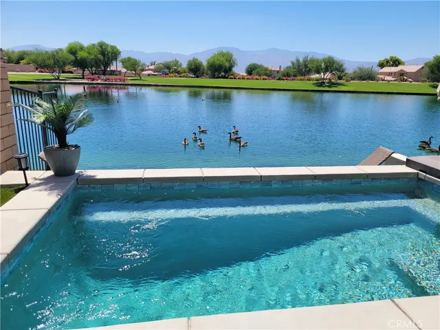 a view of a lake with a city