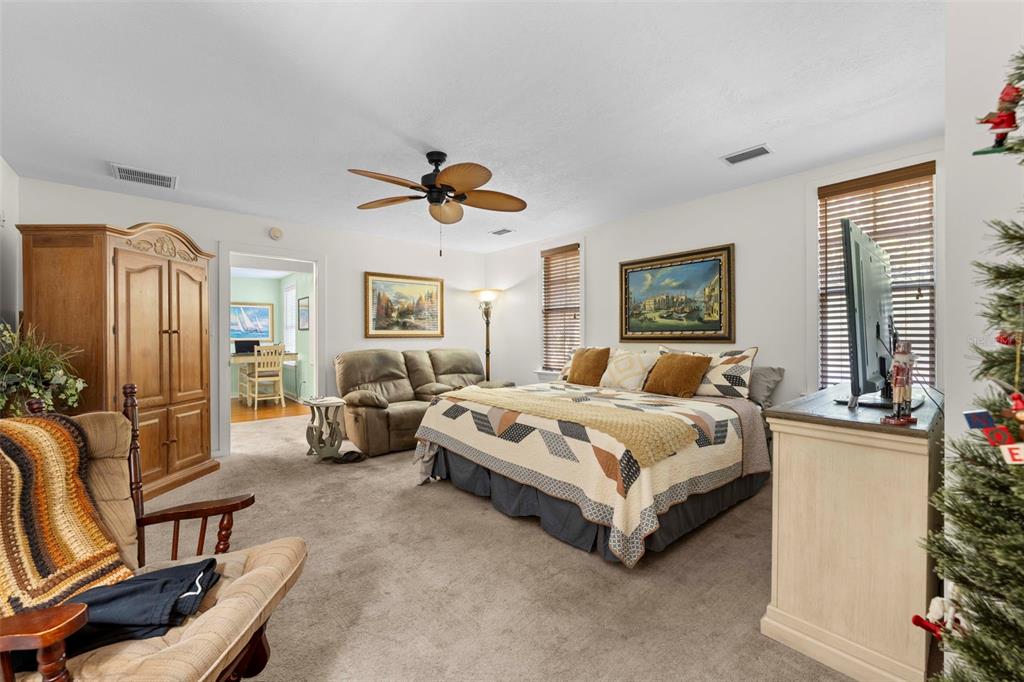 16 52nd Street Yankeetown, FL 34498 - Photo 50 of 63 a bedroom with a bed couch and window