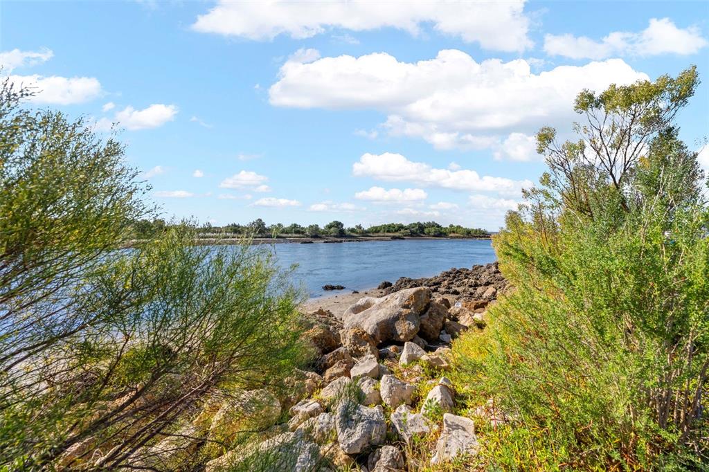 16 52nd Street Yankeetown, FL 34498 - Photo 58 of 63 a view of a lake with houses in the back